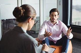 Therapy Session Between Patient & Counselor