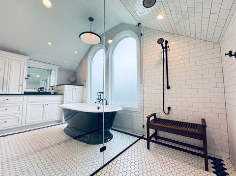 A Tiled Shower Floor & Pendant Lighting