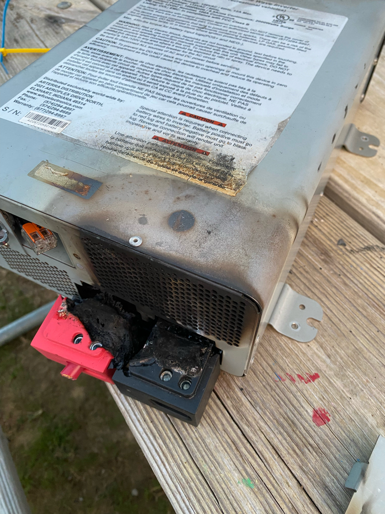 RV heating assembly with a metal housing and attached electrical components