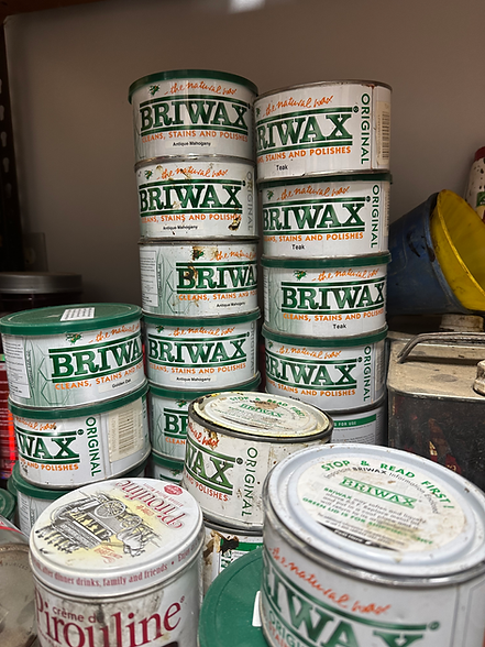 Cans of Briwax's Canauba Wax & Beeswax Polish