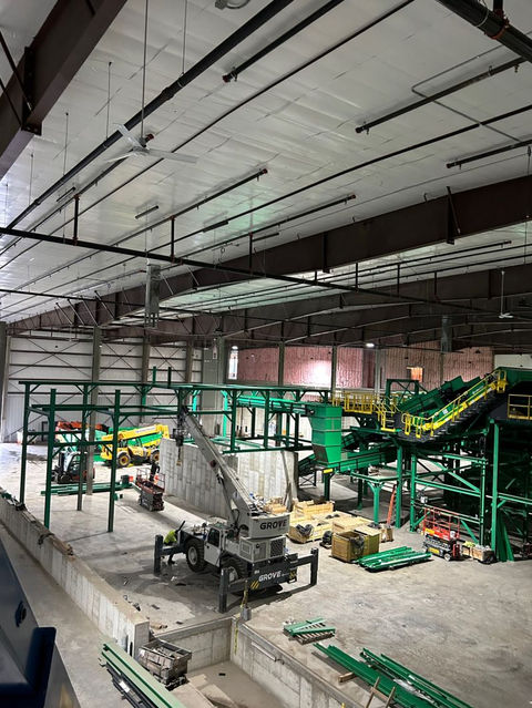 Our Employees Using a Boom Lift to Work on a Commercial Project
