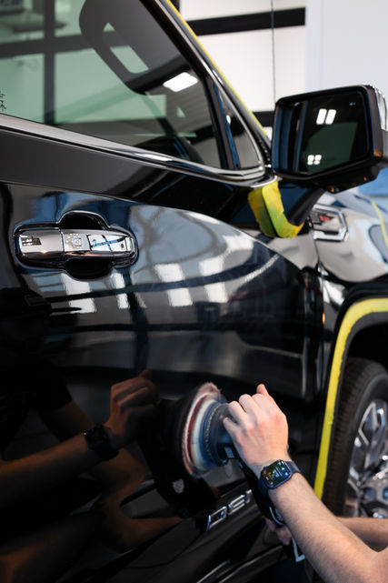 New Car Detailer Performing Paint Correction