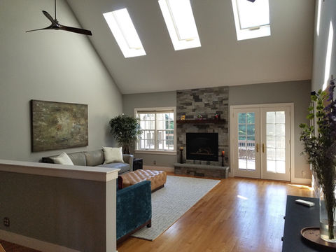 A New Living Room Complete With Fireplace & Skylights