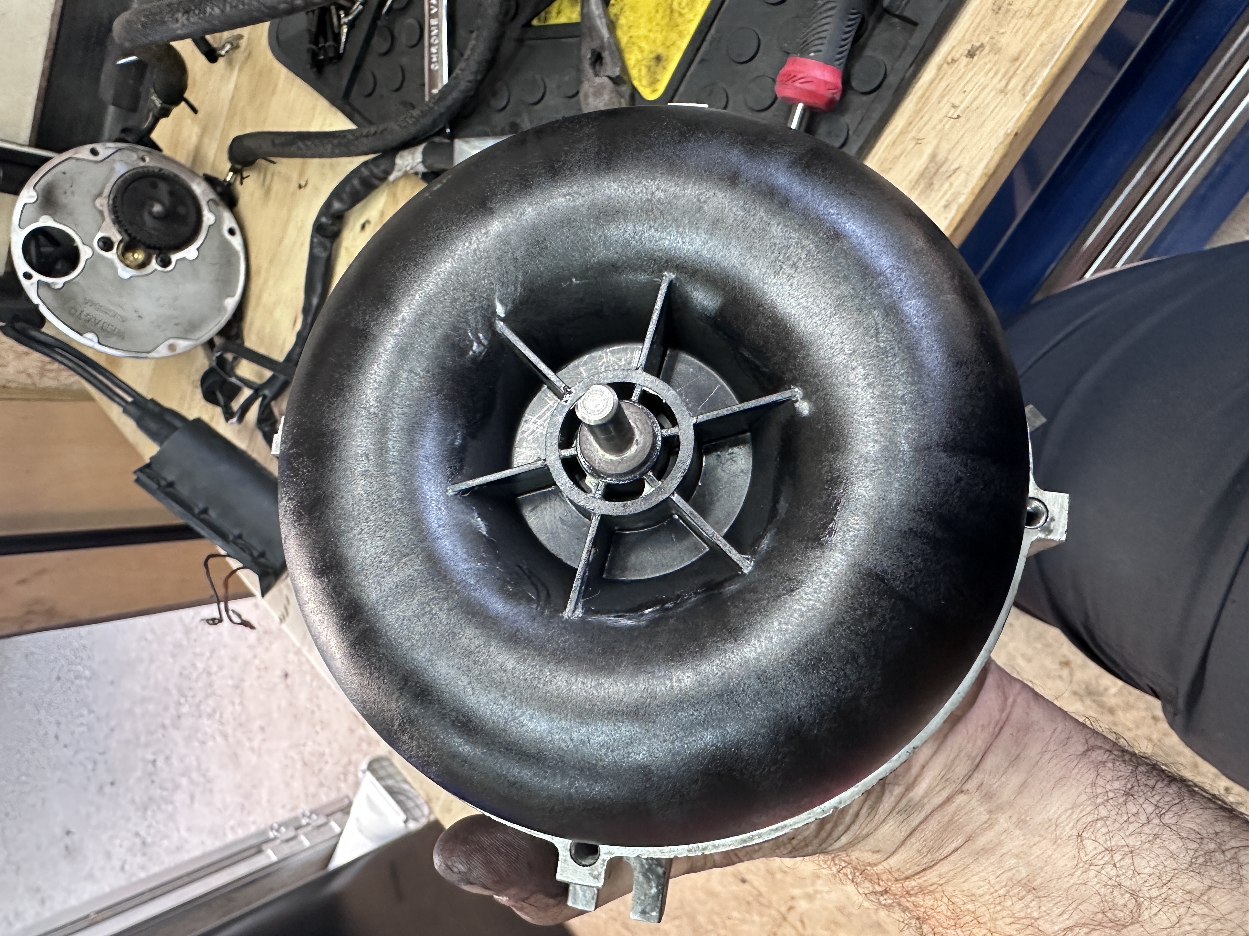 RV heating burner blower wheel and housing photographed during service