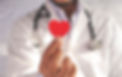 Doctor Holding a Heart Sticker