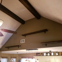 Solid Wood Beams Being Installed