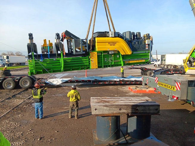 Our Industrial & Commercial Rigging Company Using a Crane to Move Machinery