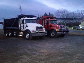 A Fleet of Tri-Axle Diesel Trucks
