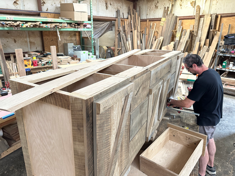 Our Woodworker Crafting Custom Cabinetry