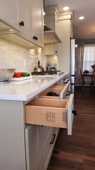 Cabinet Drawers Being Pulled Out