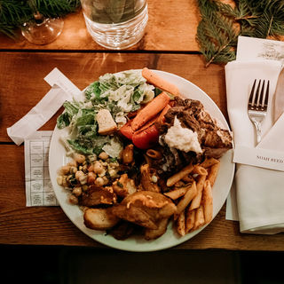 A picture of food on a platter at a wedding 