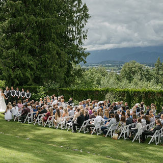  A picture showcasing a wedding ceremony in outdoors