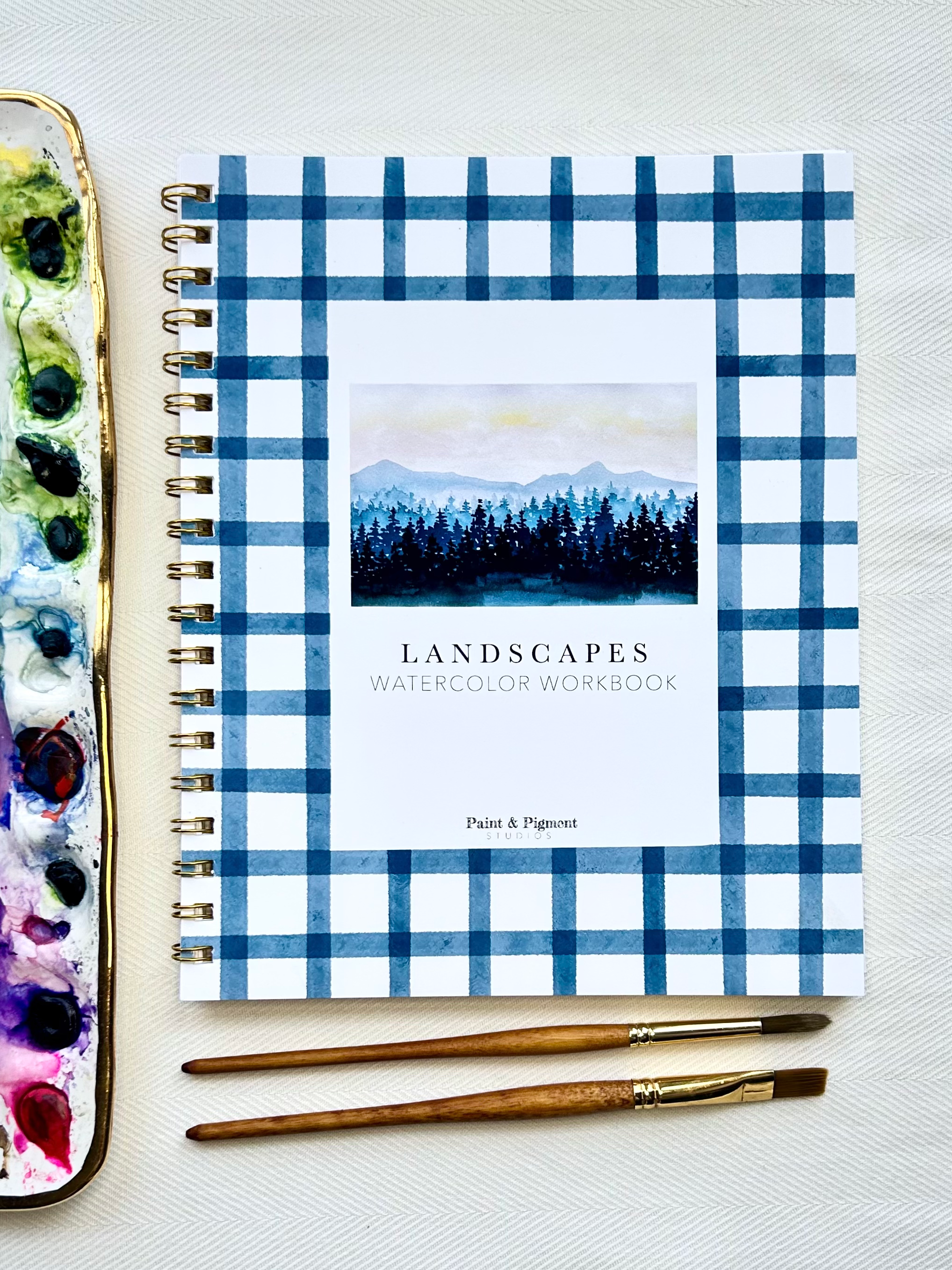 Landscape workbook front view, dark blue gingham.