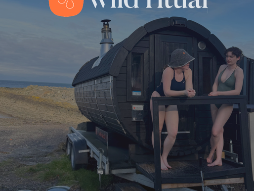 Woman relaxing in a traditional wood-fired sauna