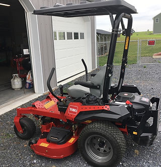 Toro with round ROPS Rhinohide canopy.jp