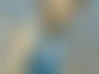 A young female child with a limb difference at the beach