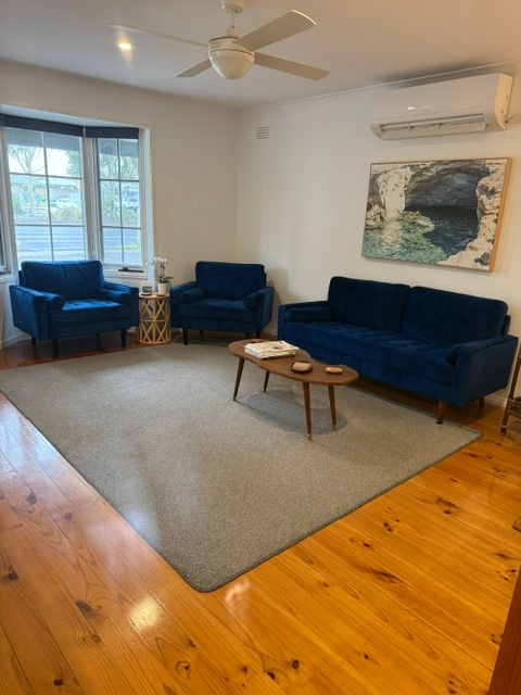 Close-up view of a meditation space with cushions and soft natural light