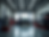 Automotive-shop-with-tools-and-car-lift-in-background-showing-seasonal-maintenance-in-prog