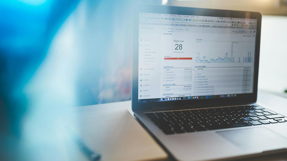 Laptop displaying Google Analytics in a modern workspace, highlighting digital analytics and technology.