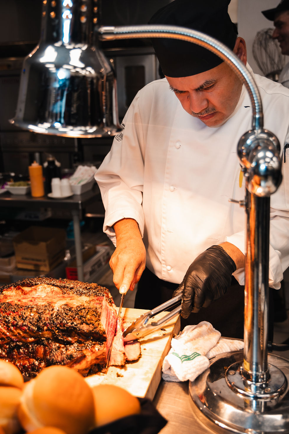 prime rib being carved at wayne enterprises chicago grand opening