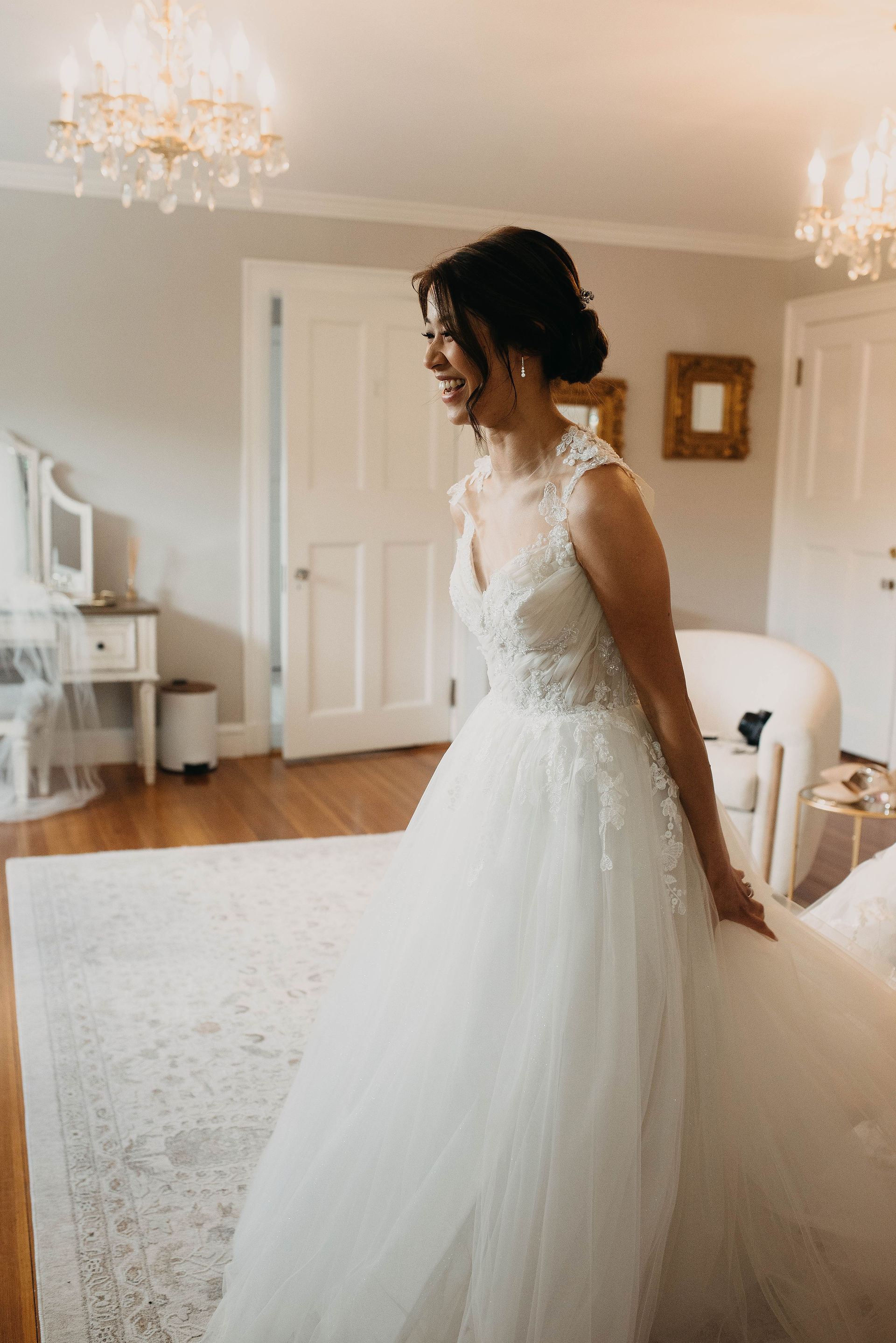 bride putting on gown at Floriana