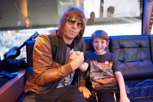 Liam Gallagher and Rory on the Gibson bus.jpg