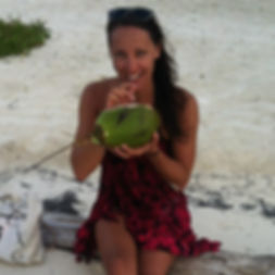 Me sipping a coconut