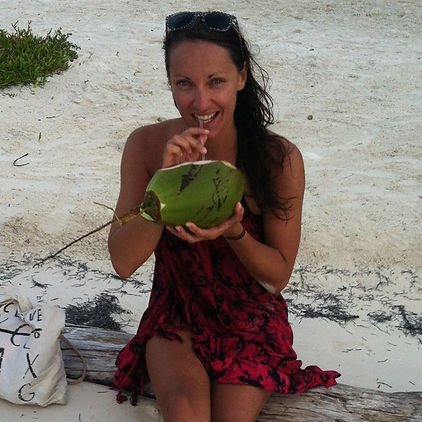 Me sipping a coconut