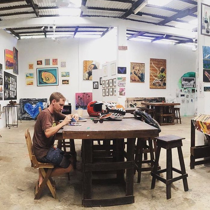 Man painting in art studio