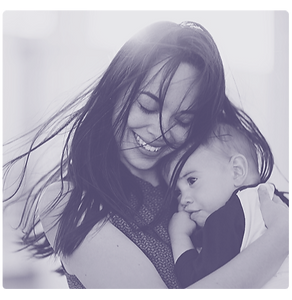 Young woman holding baby