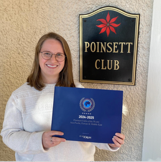 Staff Member of a top Private Club displaying the recognition