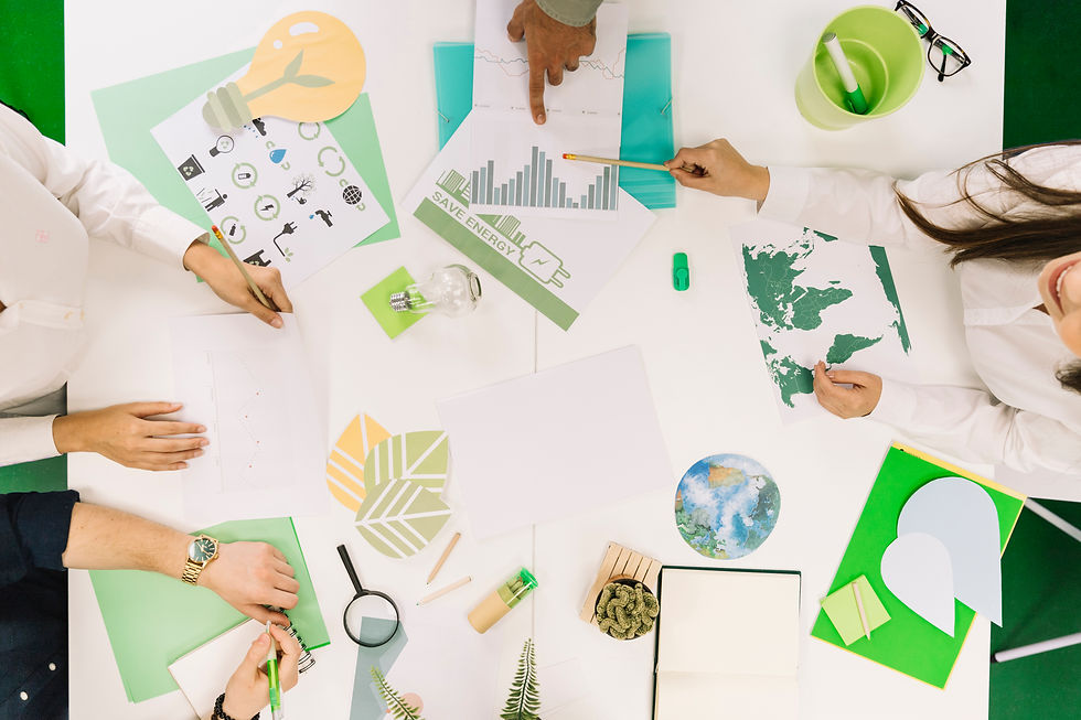 businesspeople-working-graph-with-various-natural-resources-icon-desk.jpg