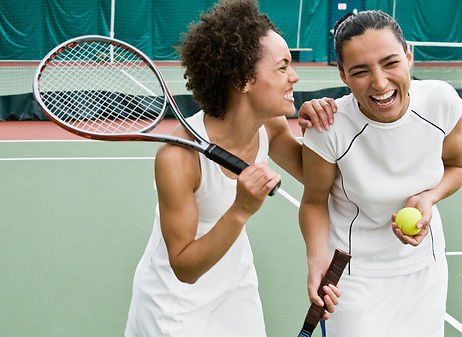 Women Playing Tennis