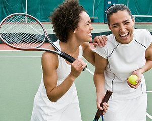 Women Playing Tennis