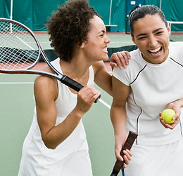 Women Playing Tennis