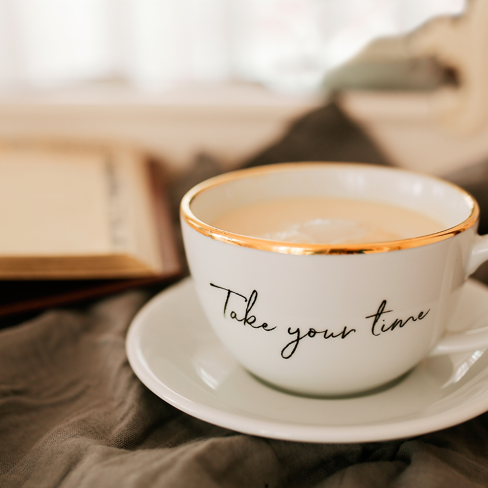 Cup of coffee with slogan take your time