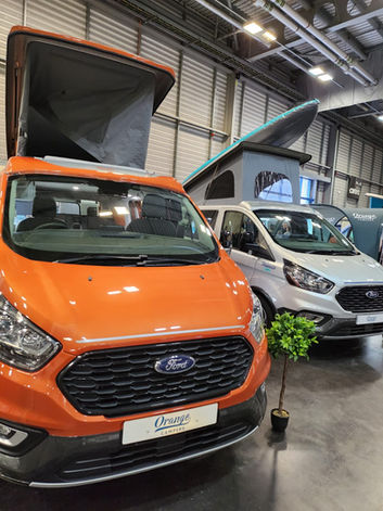 Orange Campers Orange Glow Transit Custom Active Trouvaille Actif Pop top Professional Campervan Conversion in Sheffield, UK