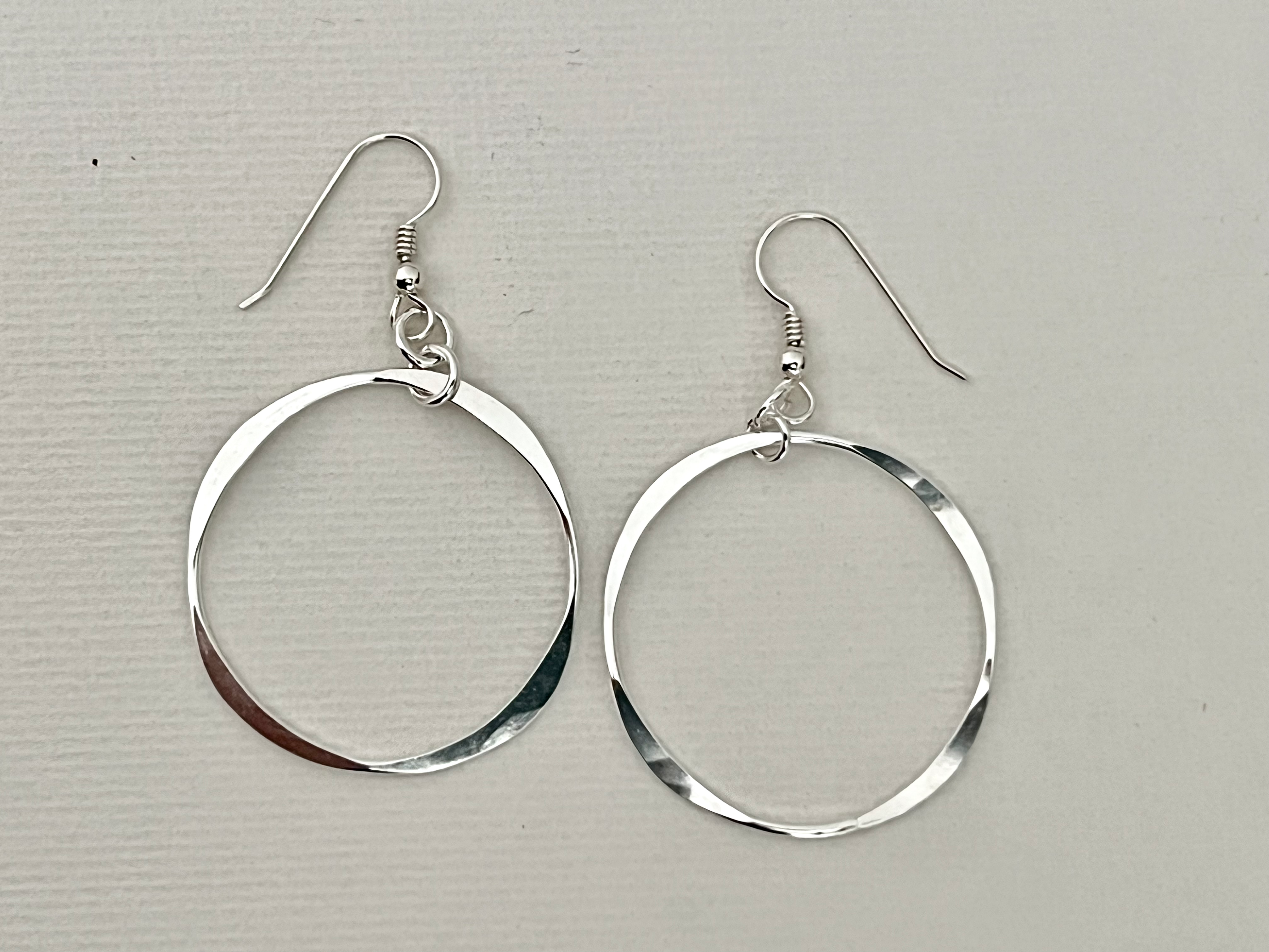 Sterling silver drop earrings.