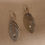 Thumbnail: Sterling Silver dangle earrings.