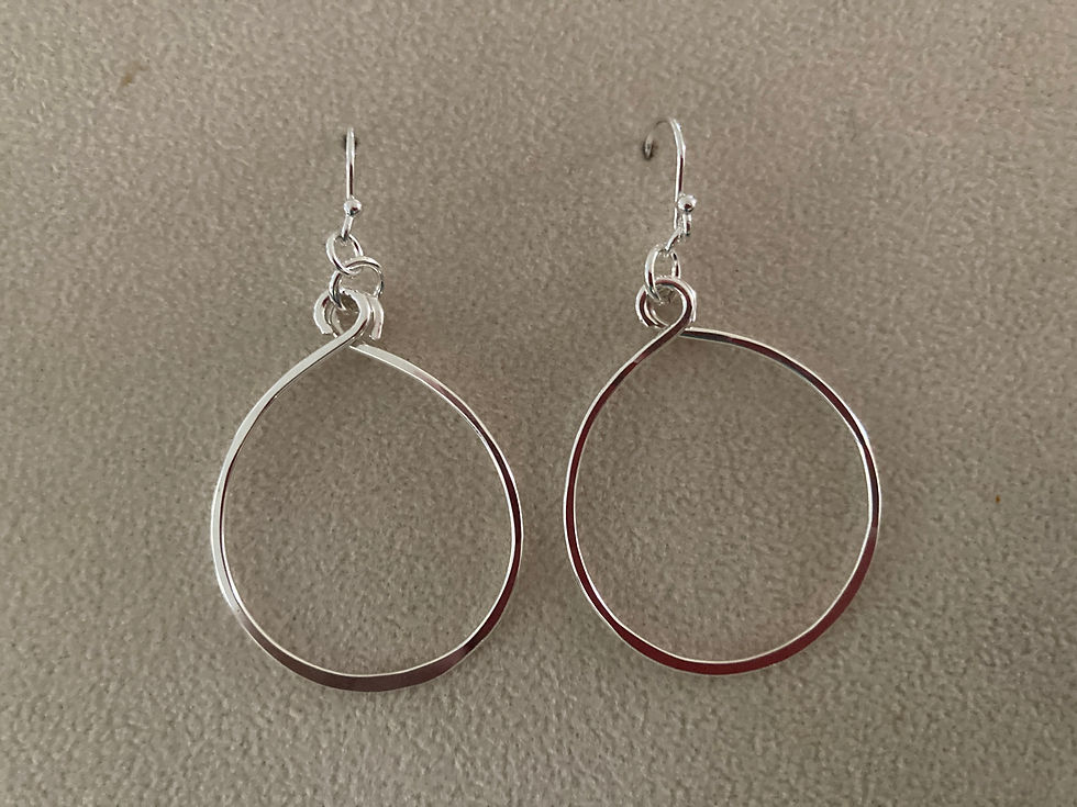 Sterling silver dangle earrings.