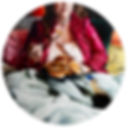 Oil painting of a woman sitting in bed dressed in a fancy robe as she eats a plate of Eggos