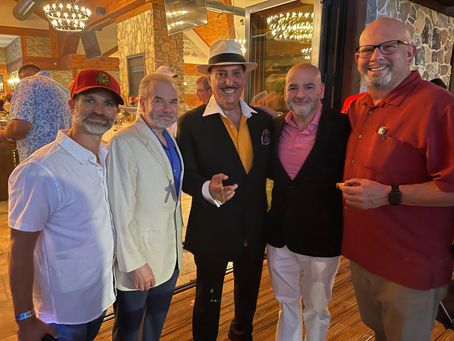 DiCE members attend Xtravaganza fund raiser with cigar, art and other rare items auction