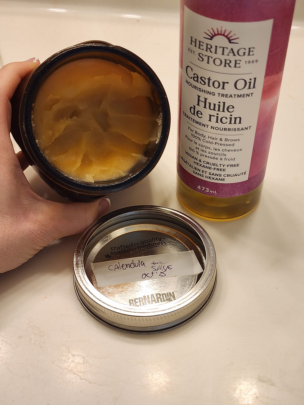 Calendula salve and castor oil bottle