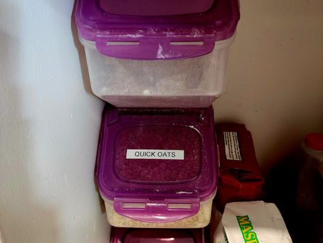 stack of bulk item bins in a pantry