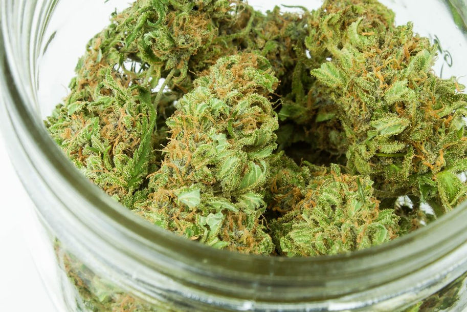 Closeup of cannabis bud in a jar