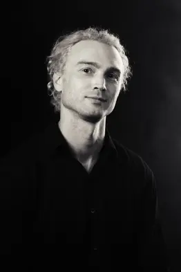 a blond man portrait photo in a studio in Bali