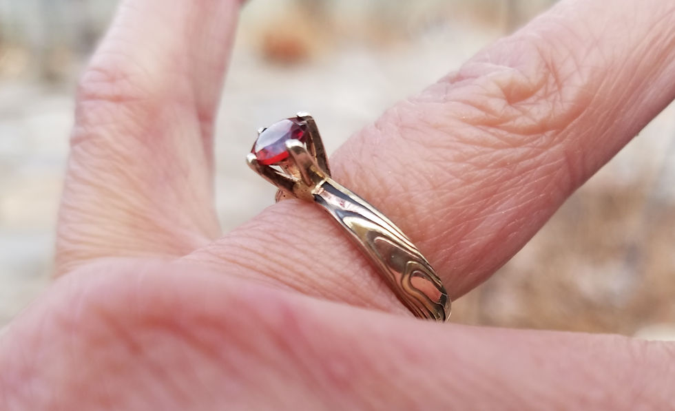 Thumbnail: Unique solitaire engagement ring made from japanese art form of mokume gane