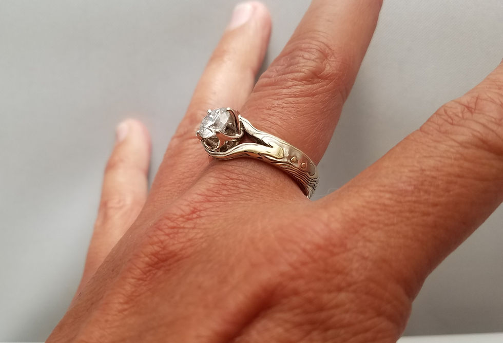 Thumbnail: nature lovers engagement ring with vines.  mokume gane engagement ring custom ring