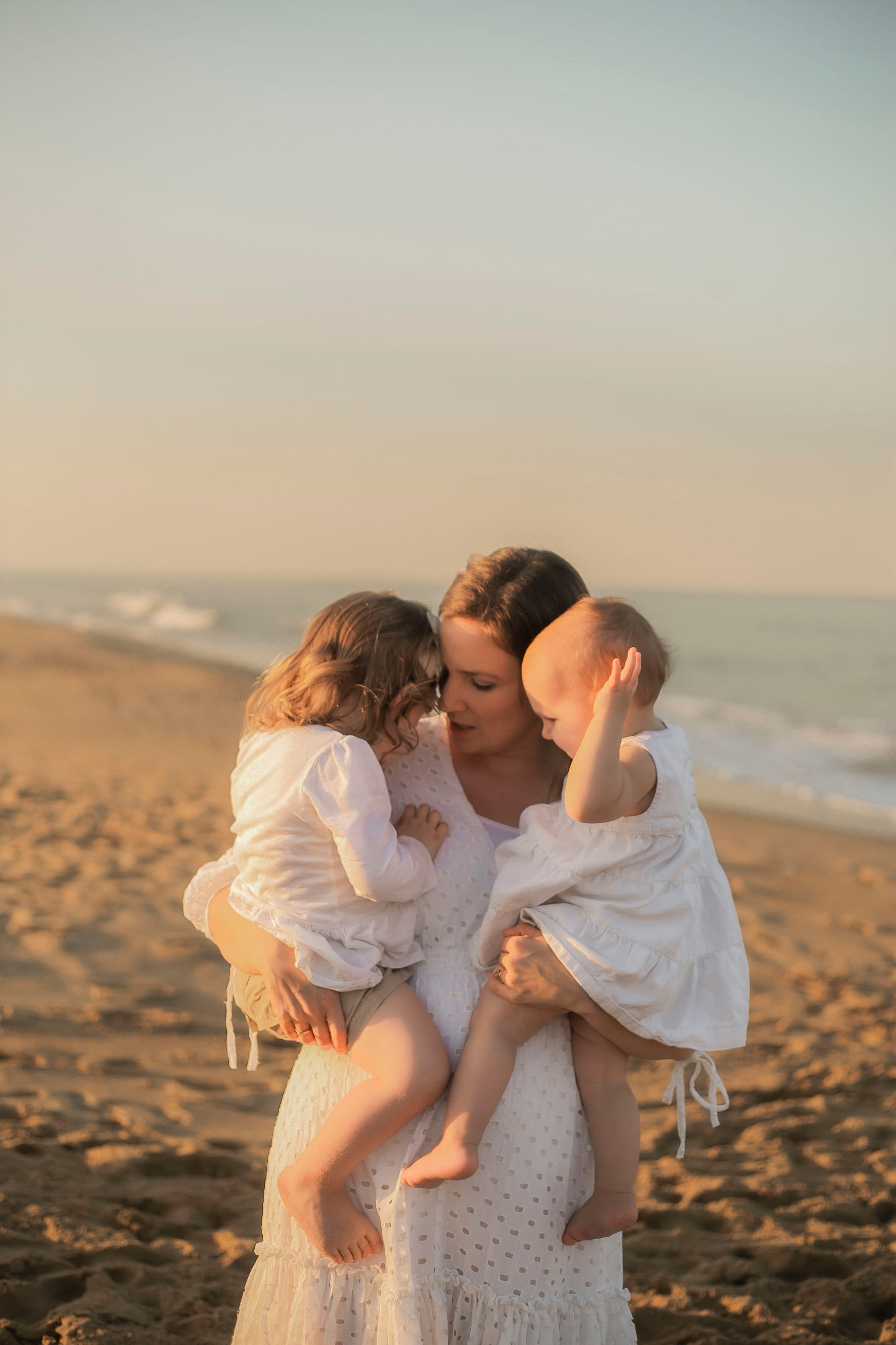 mom and child walking barefoot beach Virginia Beach photography