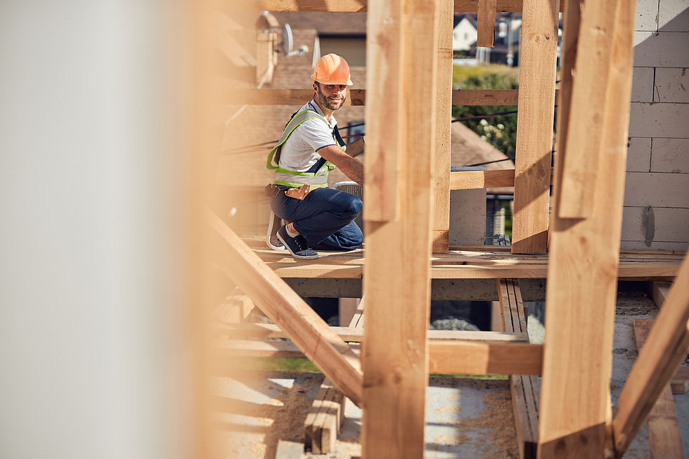 delighted-young-builder-expressing-positivity-while-working-construction-site.jpg